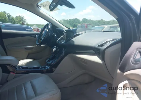 2014 Ford Escape Titanium z USA, uszkodzony, nr VIN 1FMCU0J9XEUC10891